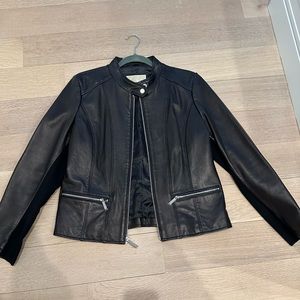 Michael Kors faux leather chocolate color. Size large. excellent condition